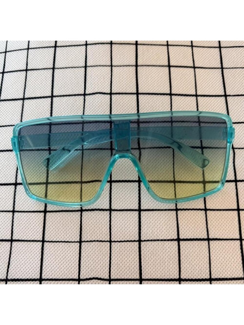 blue and green sporty glasses